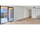 Bedroom with balcony access and light flooring at 10301 Gulf Blvd # 402, Treasure Island, FL 33706