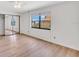 Bright bedroom featuring light flooring and mirrored closet at 10301 Gulf Blvd # 402, Treasure Island, FL 33706