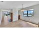 Bright dining room with water views and hardwood floors at 10301 Gulf Blvd # 402, Treasure Island, FL 33706