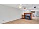 Living room with hardwood floors and fireplace at 10301 Gulf Blvd # 402, Treasure Island, FL 33706