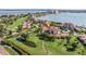 Beautiful aerial view of a golf course community with waterfront condos and lush green landscaping at 6219 Palma Del Mar S Blvd # 602, St Petersburg, FL 33715