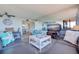 Coastal themed condo with modern furnishings, open layout, and scenic outdoor views at 6219 Palma Del Mar S Blvd # 602, St Petersburg, FL 33715