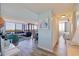 Bright living room with water view, modern furnishings, and beachy decor at 6219 Palma Del Mar S Blvd # 602, St Petersburg, FL 33715