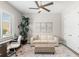 Home office features a sofa, ottoman, and desk with window views at 47A Bayview S Ct, St Petersburg, FL 33711