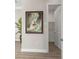 A hallway featuring framed artwork and access to a closet at 47A Bayview S Ct, St Petersburg, FL 33711