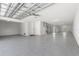 Large garage with high ceilings and epoxy flooring at 47A Bayview S Ct, St Petersburg, FL 33711