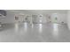 Spacious garage with epoxy flooring and ample storage at 47A Bayview S Ct, St Petersburg, FL 33711