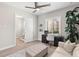 Versatile office space with built-in desk, sofa, and en-suite bathroom at 47A Bayview S Ct, St Petersburg, FL 33711