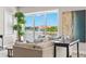 Living room with access to a balcony and views of the water at 47A Bayview S Ct, St Petersburg, FL 33711
