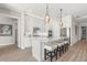 Modern kitchen with white cabinets, quartz countertops, and stainless steel appliances at 47A Bayview S Ct, St Petersburg, FL 33711