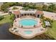 Resort-style pool and spa with surrounding patio at 47A Bayview S Ct, St Petersburg, FL 33711