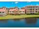 Aerial view showcasing a lakefront townhouse community at 47A Bayview S Ct, St Petersburg, FL 33711