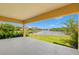 Covered patio overlooking a lake with peaceful water views at 47A Bayview S Ct, St Petersburg, FL 33711