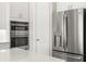 Stainless steel appliances including double oven and french door refrigerator at 47A Bayview S Ct, St Petersburg, FL 33711