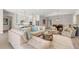 Open concept living room and kitchen with modern furniture at 47A Bayview S Ct, St Petersburg, FL 33711
