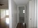 Bright hallway with hardwood floors at 940 Virginia St # 107, Dunedin, FL 34698