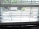 View from kitchen window showing courtyard and parking at 940 Virginia St # 107, Dunedin, FL 34698