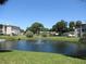 Peaceful pond with a fountain in the community at 940 Virginia St # 107, Dunedin, FL 34698