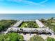 Aerial view of waterfront community with pool and courtyard at 650 Pinellas Point S Dr # 128, St Petersburg, FL 33705