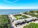 Aerial showing waterfront community, pool, and parking at 650 Pinellas Point S Dr # 128, St Petersburg, FL 33705