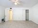 Spacious bedroom with tile floors and ceiling fan at 650 Pinellas Point S Dr # 128, St Petersburg, FL 33705
