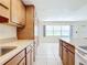Kitchen boasts a large island and ample counter space at 650 Pinellas Point S Dr # 128, St Petersburg, FL 33705