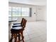 View of living area with breakfast bar and outside access at 650 Pinellas Point S Dr # 128, St Petersburg, FL 33705