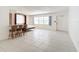 Bright living room with tile floors and a murphy bed at 650 Pinellas Point S Dr # 128, St Petersburg, FL 33705
