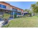A cozy backyard featuring a well-maintained lawn and enclosed patio, perfect for relaxing and enjoying outdoor living at 9543 86Th Ave # 9543, Seminole, FL 33777