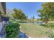 Backyard with a view of the lake and lush landscaping at 9543 86Th Ave # 9543, Seminole, FL 33777