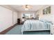 Inviting bedroom featuring a large window, and a dedicated workspace at 9543 86Th Ave # 9543, Seminole, FL 33777