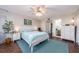 Serene bedroom with a comfortable bed, a relaxing ambiance, and natural light from the window at 9543 86Th Ave # 9543, Seminole, FL 33777