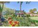 Inviting Timberwoods community sign surrounded by vibrant foliage, showcasing a beautiful and well-maintained entrance at 9543 86Th Ave # 9543, Seminole, FL 33777