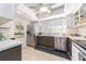 Bright kitchen featuring stainless steel appliances, white countertops, and a large window above the sink at 9543 86Th Ave # 9543, Seminole, FL 33777