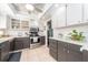 Updated kitchen featuring stainless steel appliances, light countertops, and white cabinets at 9543 86Th Ave # 9543, Seminole, FL 33777