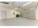 Garage with epoxy floor and overhead door at 756 Bowman Ter, Port Charlotte, FL 33953