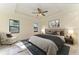 Bright bedroom featuring a king-size bed and marble floors at 756 Bowman Ter, Port Charlotte, FL 33953