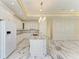 Elegant kitchen with marble countertops and white cabinetry at 756 Bowman Ter, Port Charlotte, FL 33953