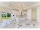 Modern kitchen featuring marble island and stainless steel appliances at 756 Bowman Ter, Port Charlotte, FL 33953