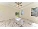 Spacious bedroom with ceiling fan and marble floors at 756 Bowman Ter, Port Charlotte, FL 33953