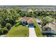 Aerial view of a single-Gathering home with a large backyard and a two-car garage at 756 Bowman Ter, Port Charlotte, FL 33953