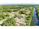Aerial view showing home, canal, and surrounding area at 756 Bowman Ter, Port Charlotte, FL 33953