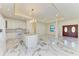 Modern kitchen with white cabinets, granite countertops and an island at 756 Bowman Ter, Port Charlotte, FL 33953
