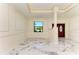 Bright living room with large window and marble floors at 756 Bowman Ter, Port Charlotte, FL 33953