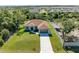 House's top view, highlighting its layout, driveway, and surrounding landscape at 756 Bowman Ter, Port Charlotte, FL 33953