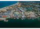 Aerial view of waterfront area featuring a marina and shops at 550 Johns Pass Ave, Madeira Beach, FL 33708