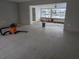 Living room undergoing renovation with new flooring at 550 Johns Pass Ave, Madeira Beach, FL 33708