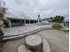Spacious backyard with pool and patio area at 550 Johns Pass Ave, Madeira Beach, FL 33708