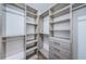 Large walk-in closet with ample shelving and hanging space at 550 Johns Pass Ave, Madeira Beach, FL 33708