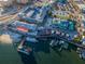 Aerial view of waterfront area with shops and boats at 550 Johns Pass Ave, Madeira Beach, FL 33708